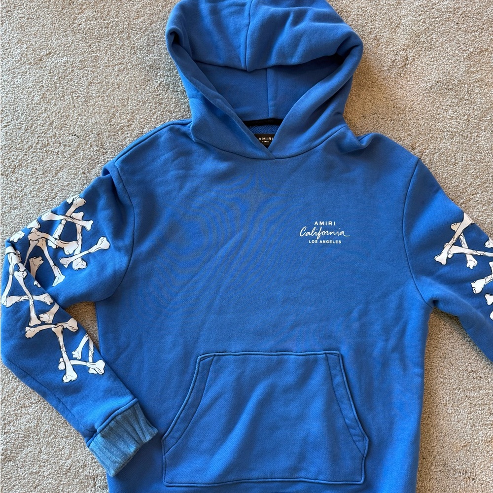 AMIRI Blue Hoodie with Skeleton Sleeve Design